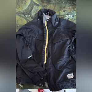 Helly Hansen Kids Black waterproof Puffer Jacket with Yellow Accents